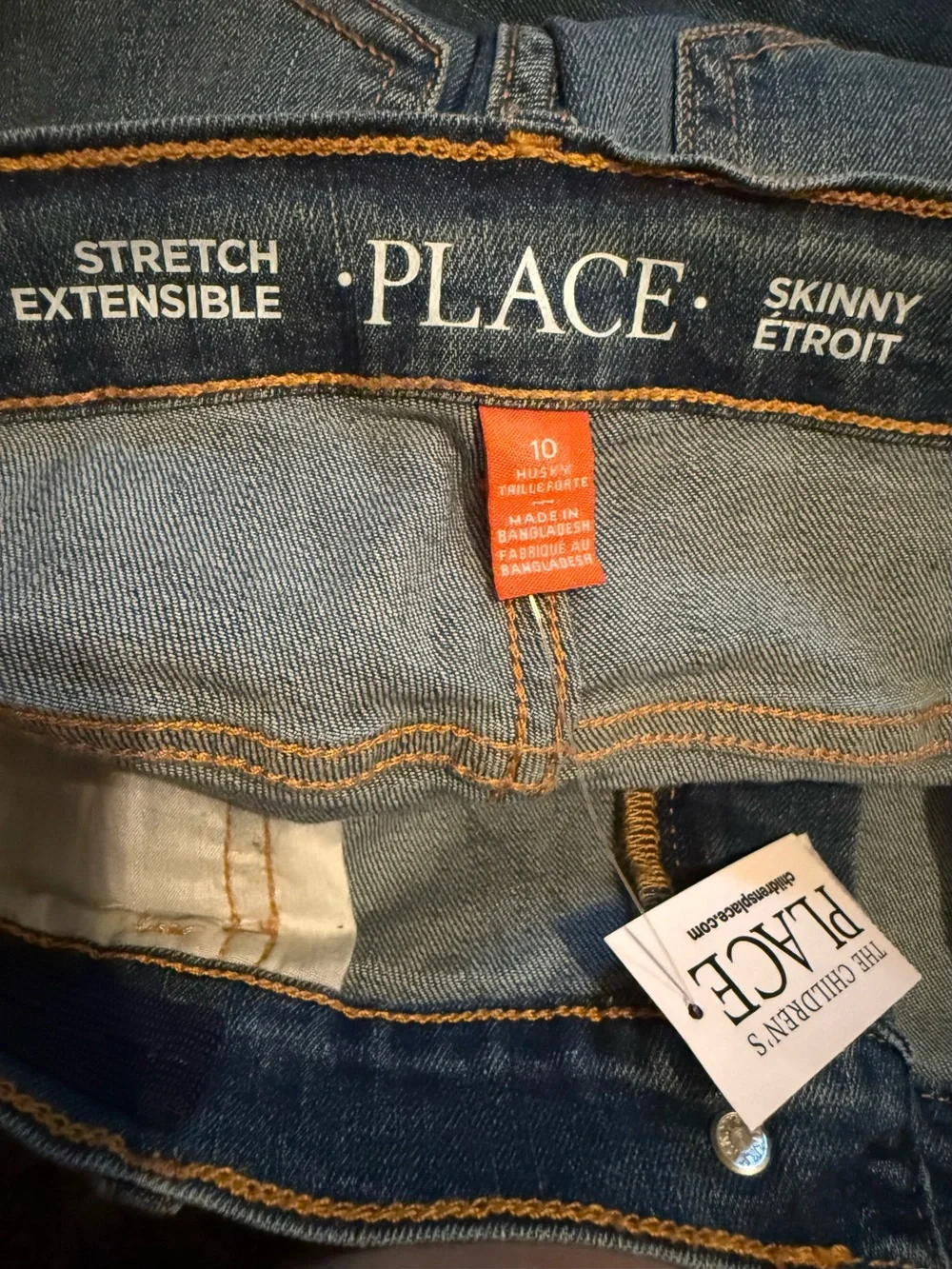 The Children's Place Boys' Stretch skinny jeans in a blue 10 Husky
